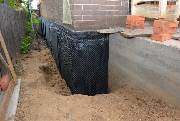 SJ Waterproofing Pros technician performing targeted Vapor Barrier Installation assessment in Blakeslee, OH